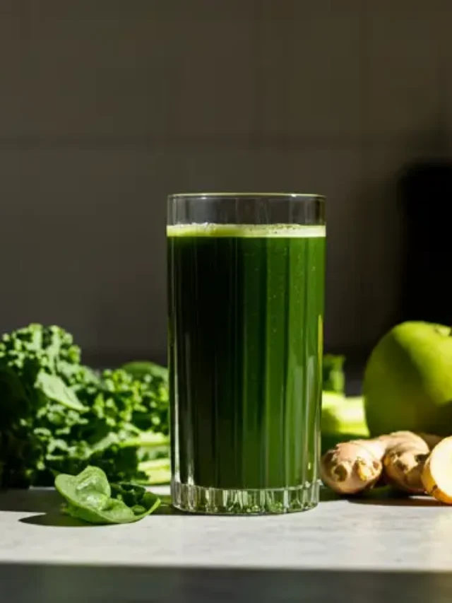 A vibrant Green Energy Elixir in a glass, garnished with a lime wedge and a sprinkle of chia seeds, radiating health and vitality.