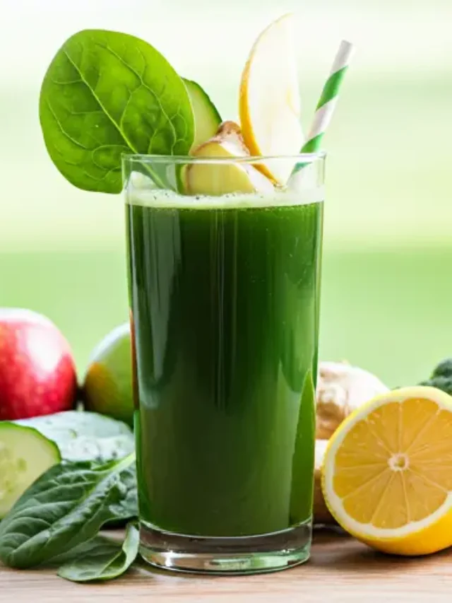 A radiant glass of Energizing Elixir of Vitality, with a vibrant golden-orange hue, garnished with a slice of orange and a sprinkle of chia seeds.