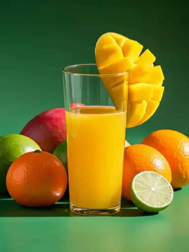 A vibrant glass of Tropical Mango Citrus Fusion, with a sunny orange-yellow hue, garnished with a slice of mango and a twist of lime.