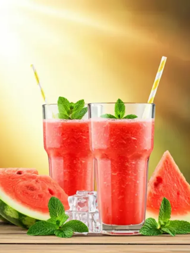 Refreshing Watermelon Bliss Smoothie : A vibrant pink watermelon smoothie in a chilled glass, garnished with fresh mint leaves.