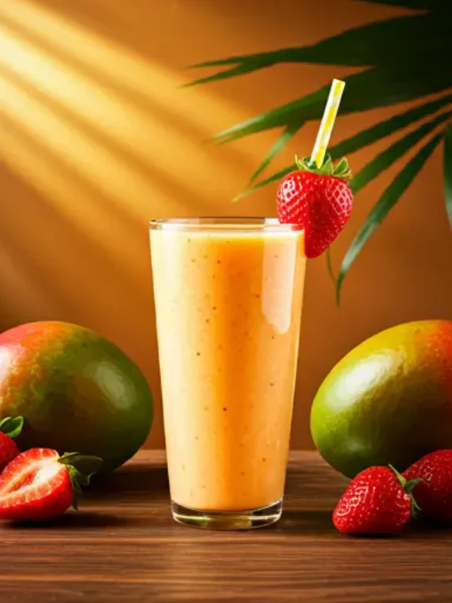 Sun-Kissed Mango Berry Bliss Smoothie A vibrant mango and berry smoothie served in a glass, garnished with fresh fruit.