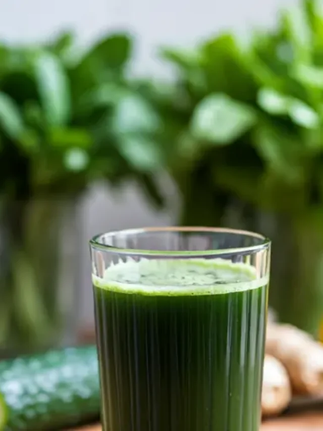 Nutrient-Packed Mineral Infusion A vibrant green mineral-rich infusion in a glass, garnished with fresh herbs and citrus slices.